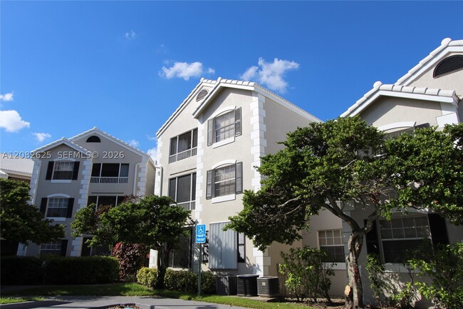 Building Photo - 2881 N Oakland Forest Dr Unit 206