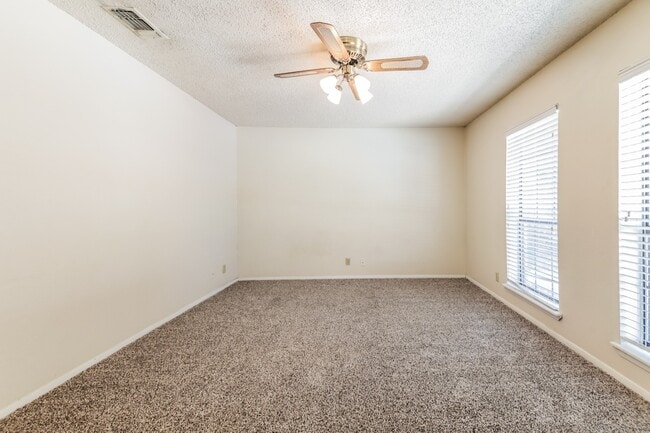 Photo - Charming 2BR/1BA Sherman Townhome with Private Fenced Backyard – Move-In Ready