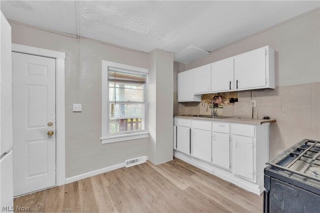 Photo - 7945 Lorain Ave Unit 7947/Back House