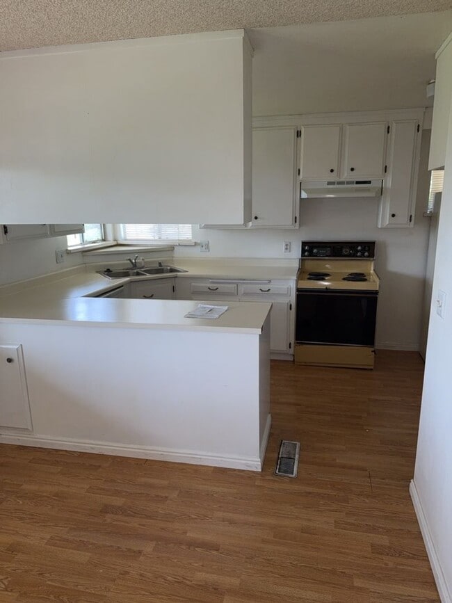 Photo - Charming 3-bedroom, 2-bathroom home is nes...
