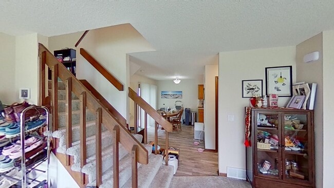 Photo - 2 BR, 1.5 BA Clive split level duplex. Deck and one car attached garage.