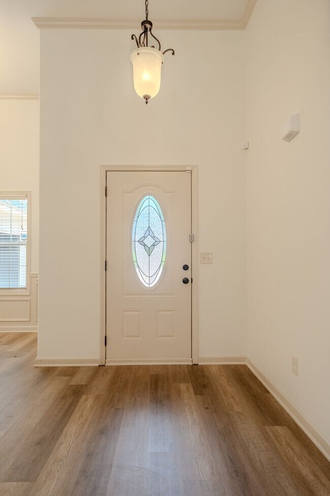 Photo - Spacious 3BR Home with Bonus Suite, Fenced Yard & 2-Car Garage