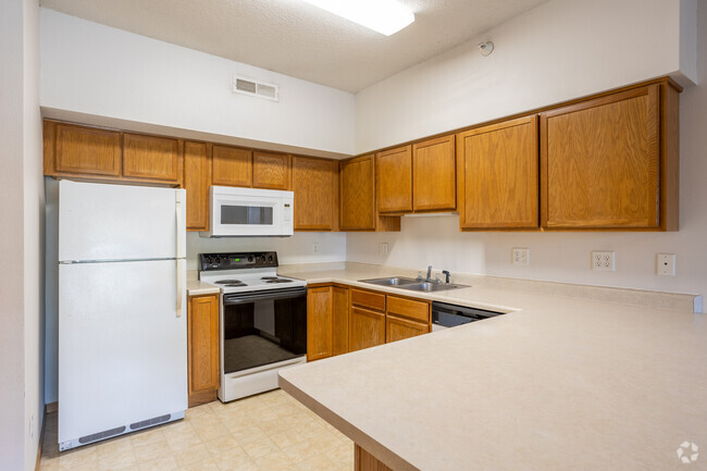 2BR, 1BA - Cocina en la planta baja de 920SF - 916-935 Harlocke St Apartamentos