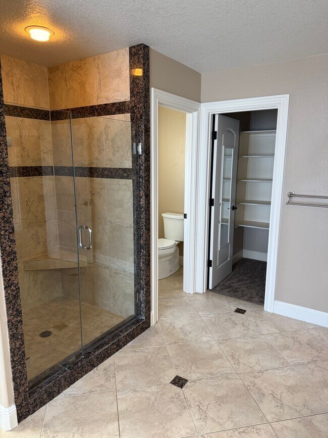 Photo - Goregous 5 Bedroom Home! Great Location! Vaulted Ceilings! Fenced Yard! 3- Car Garage & More!