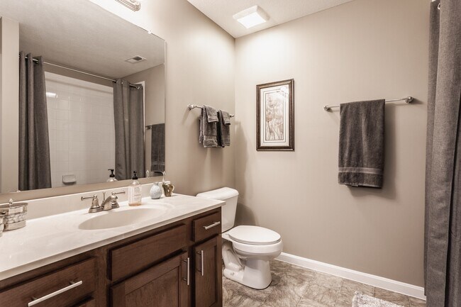 Step into a beautifully designed bathroom with a functional vanity, stylish finishes, and a bright, welcoming atmosphere.