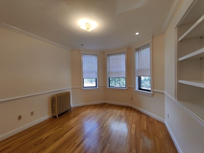 Photo - No Brokers Fee, No Security Deposit, Steps from the T Stop, Heat, Hot Water Included, Laundry is ...
