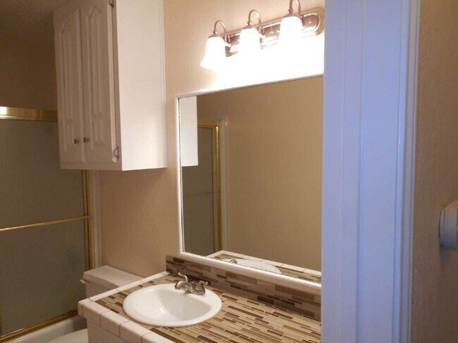 Photo - "Charming 3-Bedroom Haven with Cozy Fireplace on Emory Street in Lubbock!"