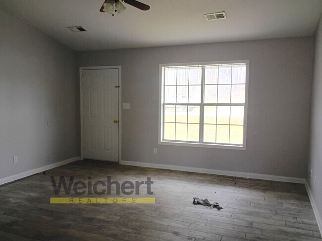 Photo - Spacious 3BR/2BA with Carport & Large Yard