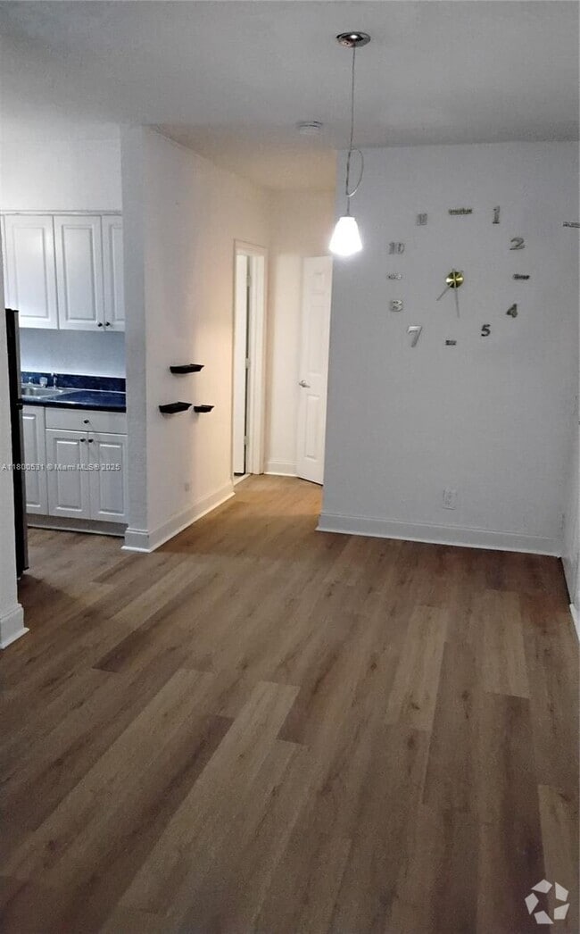 Building Photo - 7334 Harding Ave Unit 16 Rental