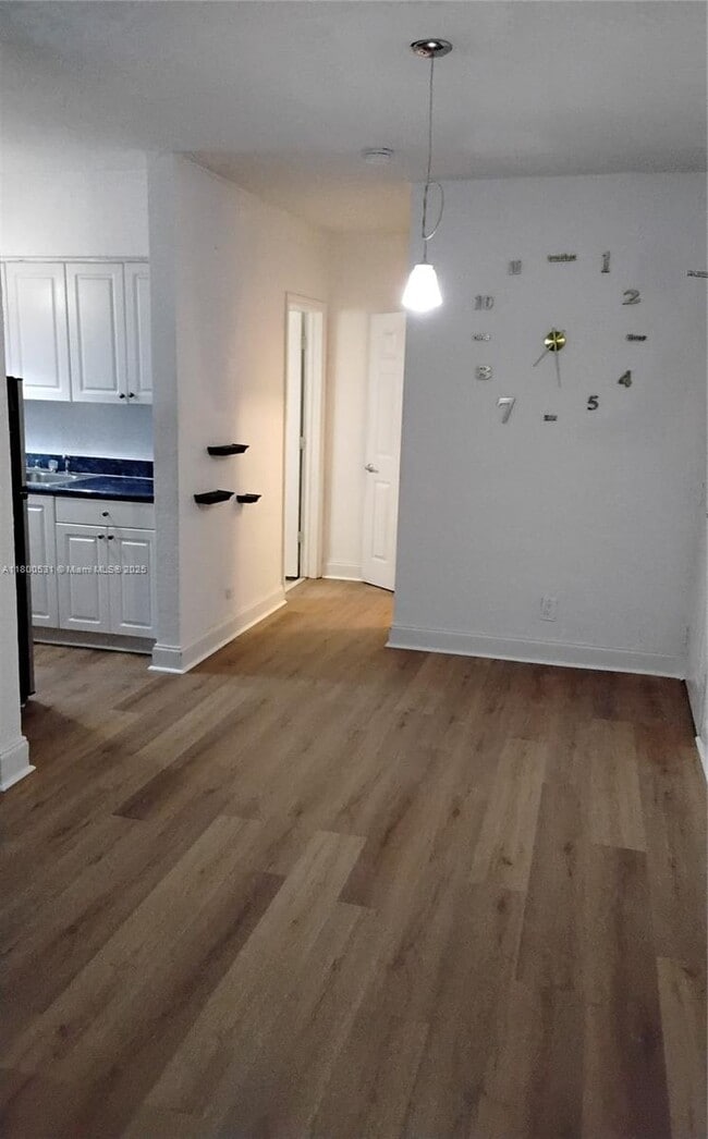Building Photo - 7334 Harding Ave Unit 16 Rental