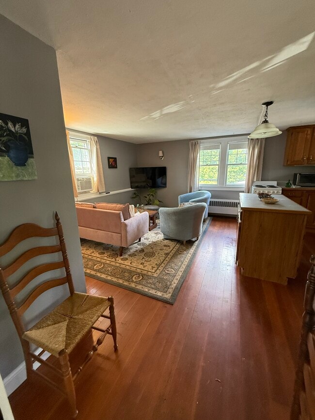 Open floor plan for living room, dining and kitchen - 32 Meadow St Rental