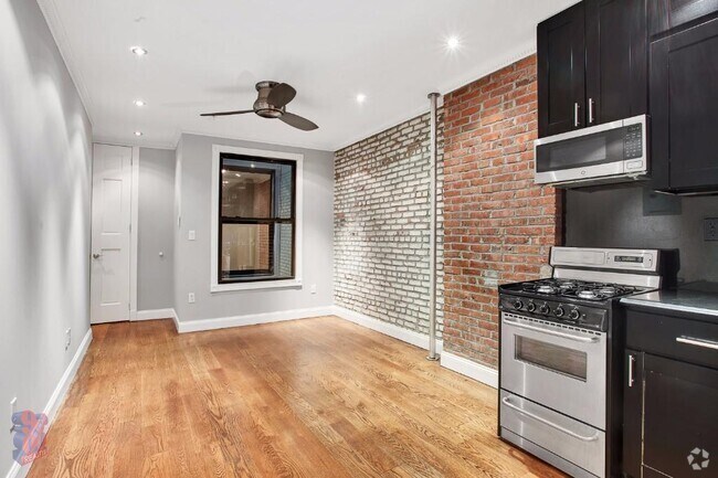 Building Photo - 436 W 52nd St Unit 7C Rental