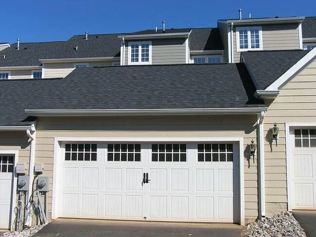 Photo - Beautiful townhome - 4BR, 2 full Ba + 2 1/2 Ba in a great location- 2 car garage