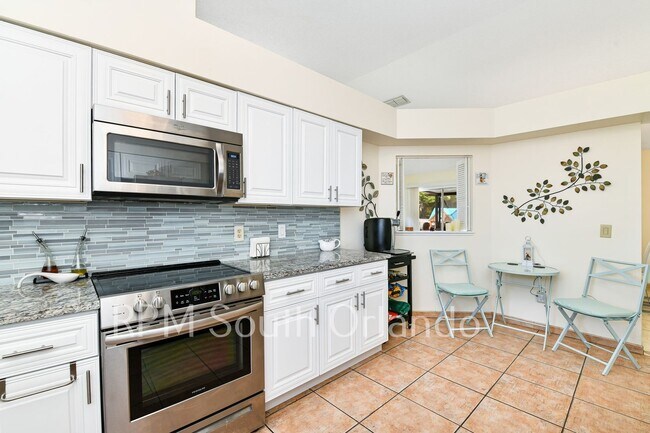 Photo - 4 Bedroom, 2 bathroom, 2 car garage, pool, backyard, close to Universal Studios and International...
