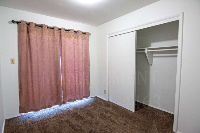 Photo - Spacious 2-Bedroom Apartment with Off-Street Parking & On-Site Laundry