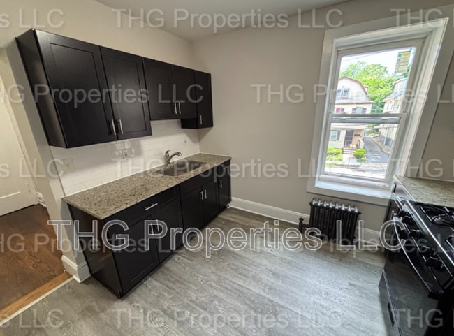 Building Photo - 490 Tremont Ave Unit 490-23