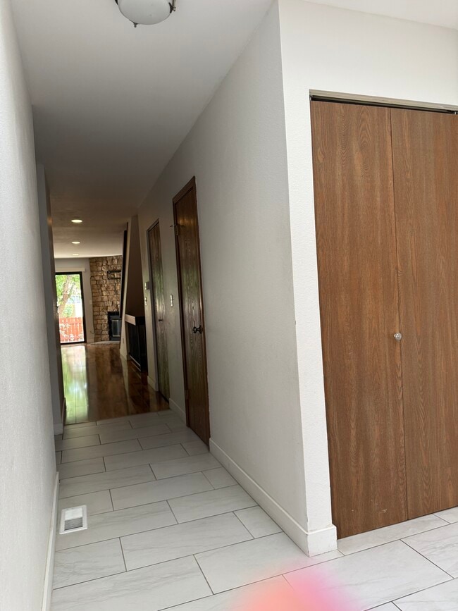 Hall with Main Floor 1/2 Bathroom Door