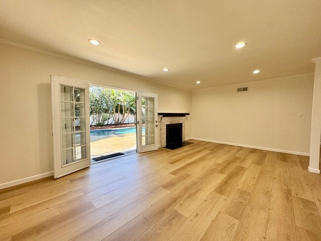 Building Photo - Newly Remodeled! 3 BEDROOM 2 BATH TRADITIONAL HOME WITH A POOL and CHARM