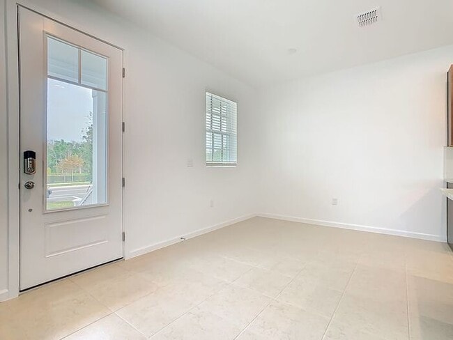 Photo - New Luxury Townhome in Celebration, FL Corner unit. All porcelain tiled floors. Aleutian model by...