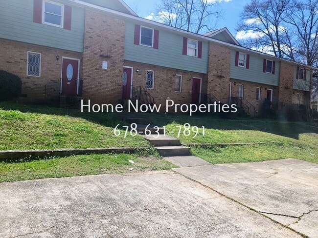 Building Photo - Modern Townhome w/ Granite Kitchen + Fenced Yard – Move-In Ready