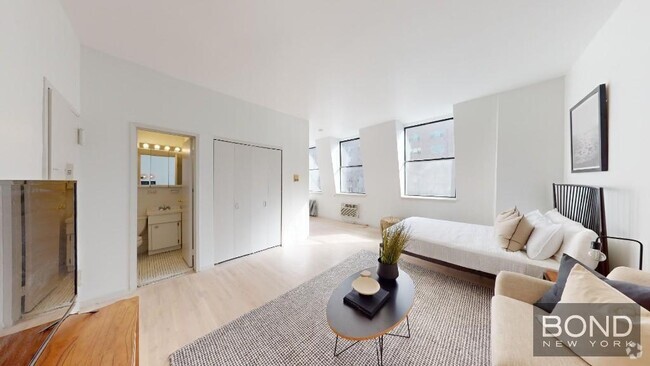 Building Photo - 201 W 14th St Unit 5C Rental
