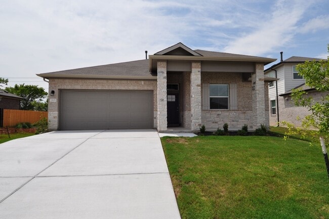 Photo - Home has an amazing entrance leading to the large family room open to the kitchen and dining room