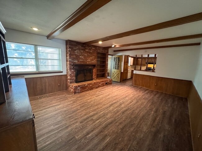 Photo - 2 living areas and a bonus room, new flooring and paint!  Call today for your personal tour 405-6...