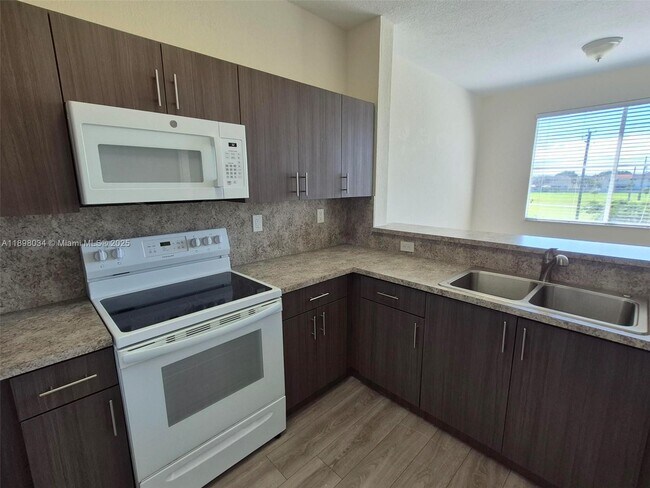Photo - 17820 NW 73rd Ave Unit 201-1