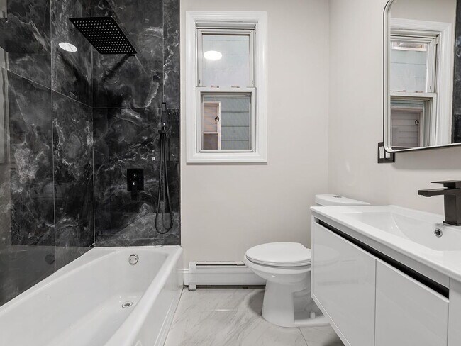 Building Photo - 3-Bedroom Gem with Modern Comfort in Bayonne – 1300 Sq. Ft. of Urban Living!"