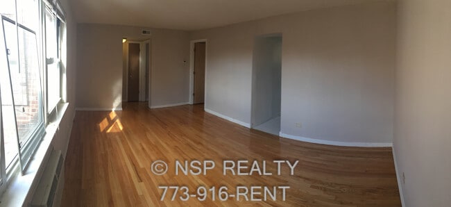 Building Photo - 4920 Mulford St Unit 3N