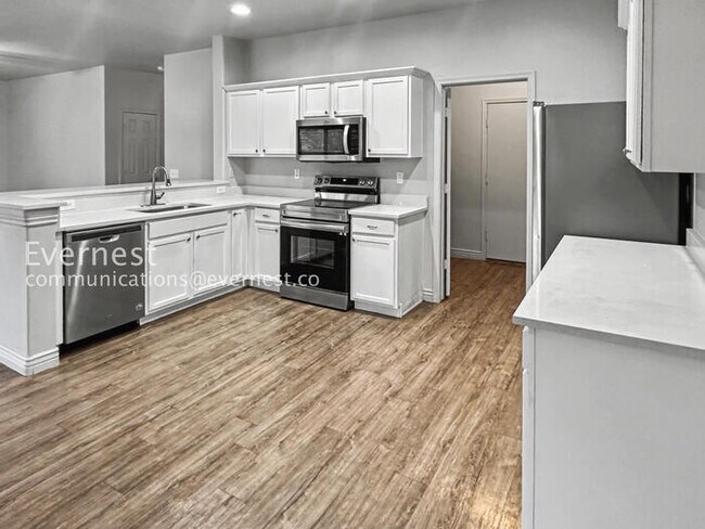 Photo - Limited Time Special Offer / 4 Bed, 3 Bath Home with Garage / Pet-Friendly / Vouchers Accepted / ...