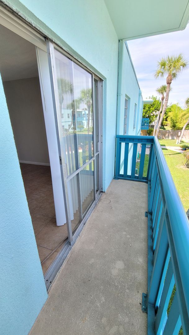 Photo - Cozy Beachside Condo in Cape Canaveral Including pool, basic cable, and water.