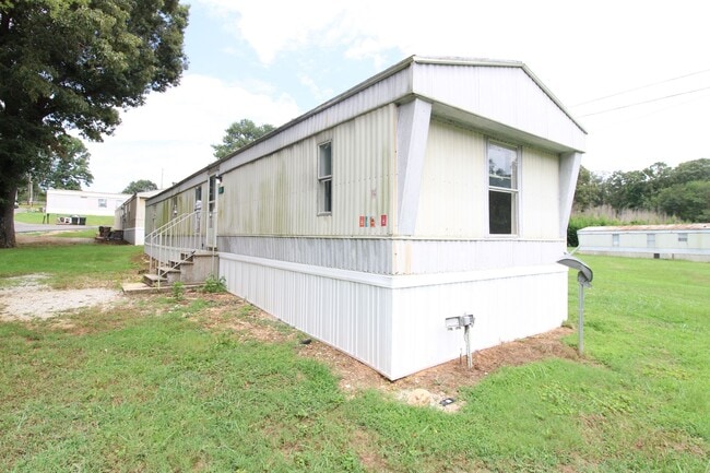 Building Photo - Move-In Ready • 3 Bedrooms • Lawn Care Included!