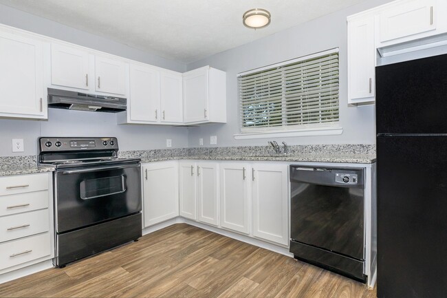 RENOVATED 2BRx1BA: Kitchen - Woodbend Apartments