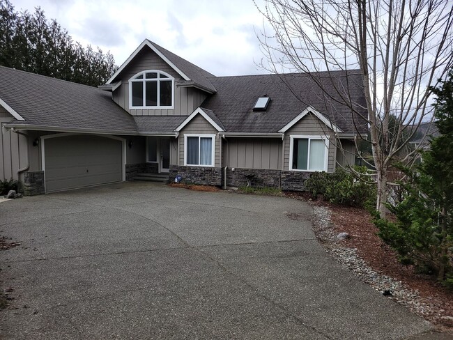 Photo - Lake Retreat Waterfront Living | Spacious Home with Views + Utilities Included