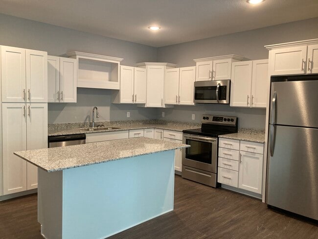 White Kitchen - Trails Edge of Maplewood Apartments
