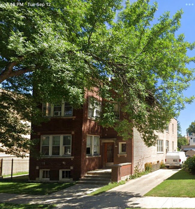 Building Photo - 5727 N Washtenaw Ave Unit 2