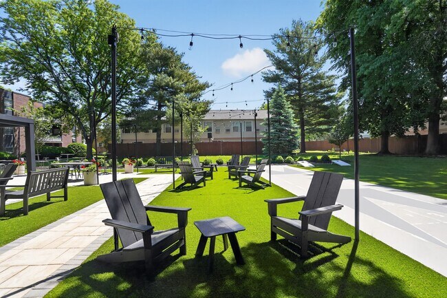 Unwind in the lush outdoor spaces of Eagle Rock Apartments and Townhomes at Brighton. Enjoy serene spots with cozy seating, perfect for relaxation or gathering with friends. Schedule your tour today and envision your new lifestyle!