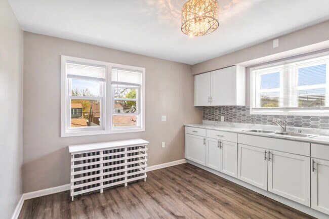 This spacious upper unit features 2 comfortable bedrooms with carpeting