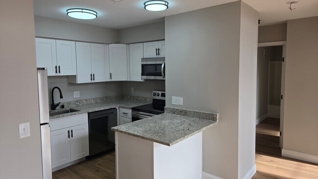 Newly Renovated Kitchen - Homestead Court Townhomes