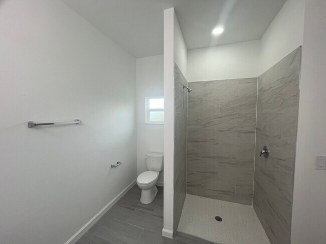 Photo - MOVE IN READY & BRAND NEW! Spacious 4 BD/ 2BA/ 2 Car Garage in Lehigh Acres