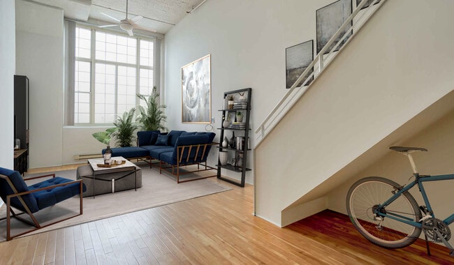 Wood floors throughout the kitchen and living room