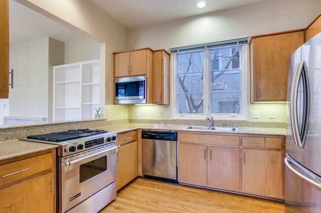The Kitchen with Stainless Appliances including a gas cooktop - 3915 Cole Ave Unit 1