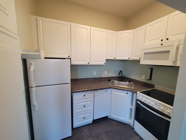 Photo - Charming 1 BR/1 BA Top Floor Condo Unit in...