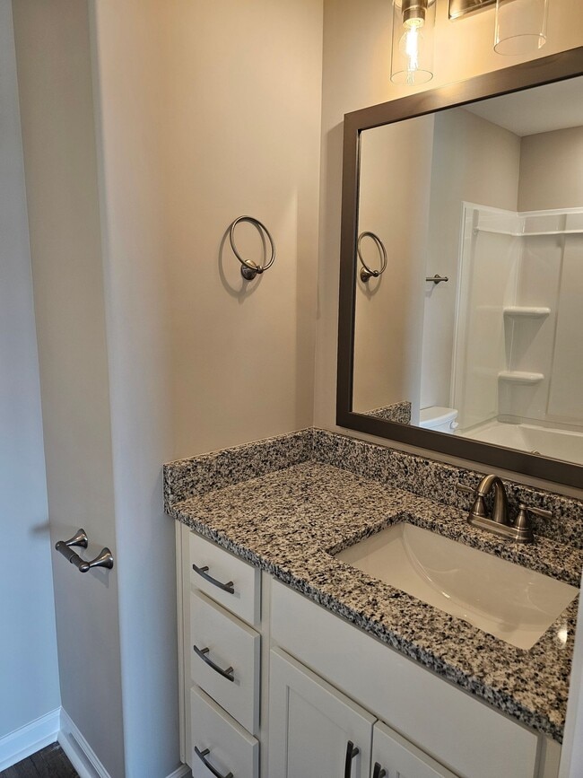 Photo - Built in 2024! Close to downtown 2 Bed/2.5 Bath. Nice private backyard with trees