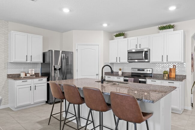 Photo - 4BR Under $2,300/mo | Tesla Charger | 15 Min to Lake Nona