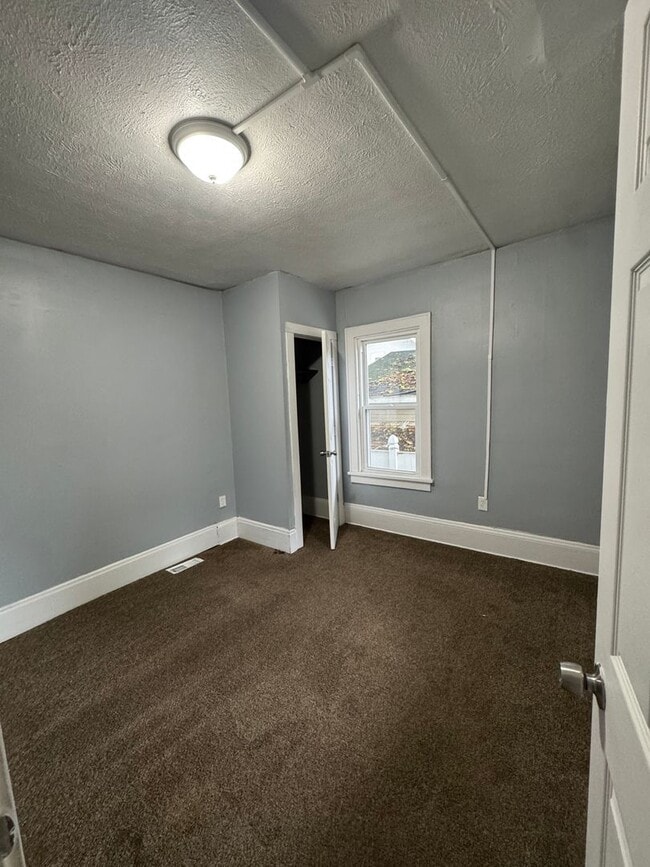 Photo - Updated 3-Bedroom Home with Modern Grey Finishes – Open House Feb 7