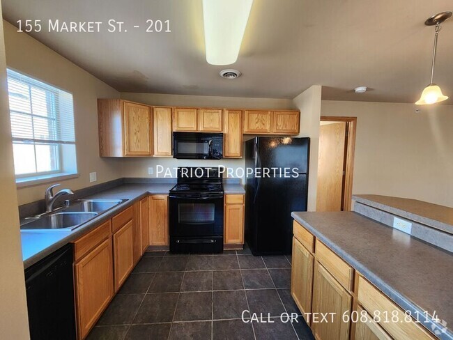 Building Photo - 2 BED / 2 BATH IN DOWNTOWN SUN PRAIRIE Unit 201 Rental