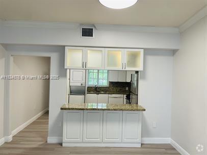 Building Photo - 1135 92nd St Unit 202 Rental