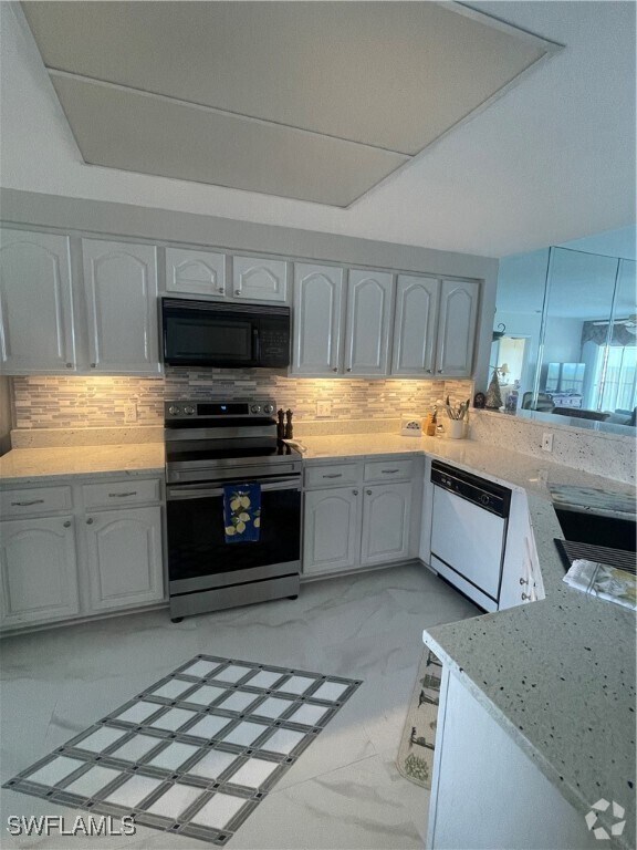 Building Photo - 13105 Vanderbilt Dr Unit 808 Rental